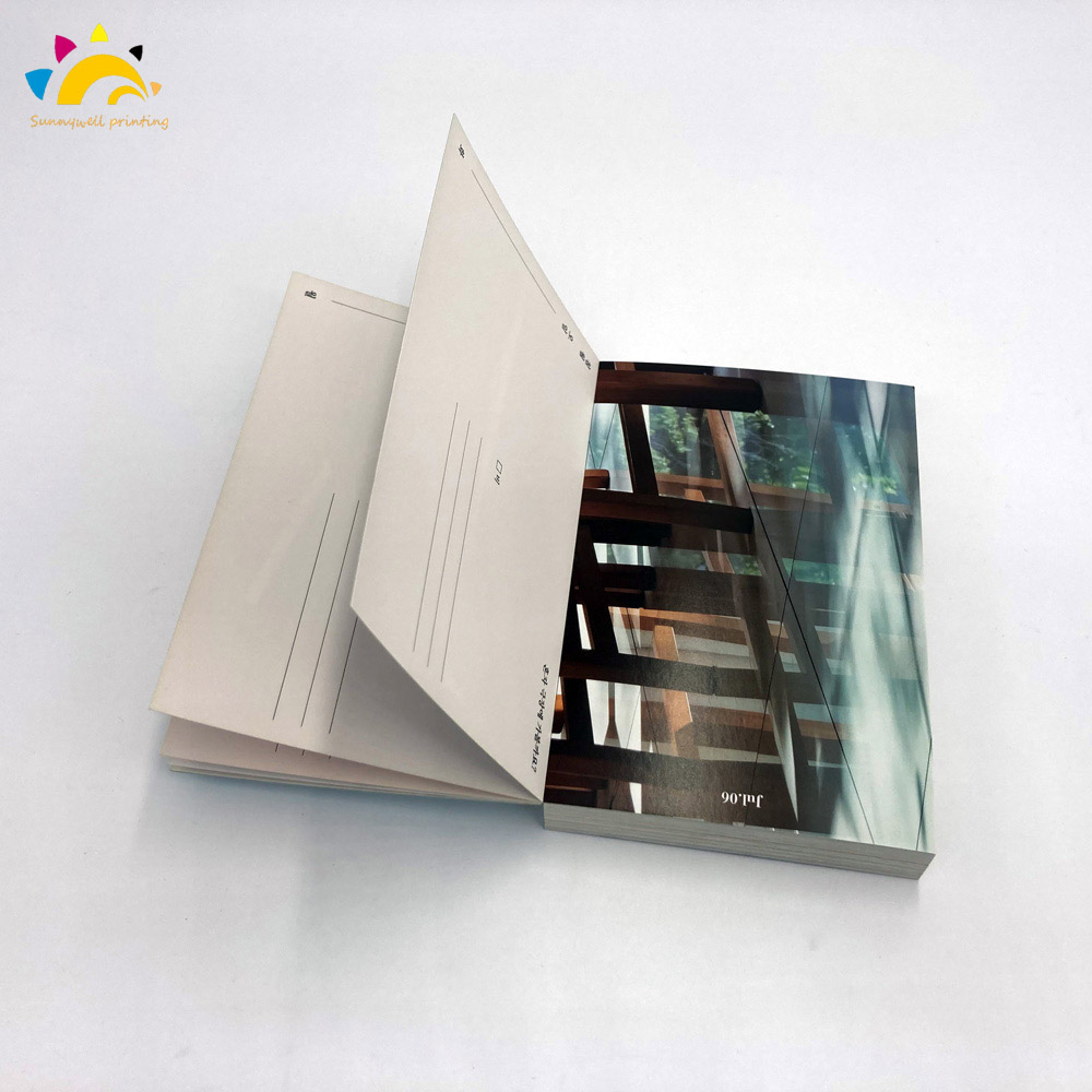 Livre postal Imprimerie Déchirure du livre de la carte postale